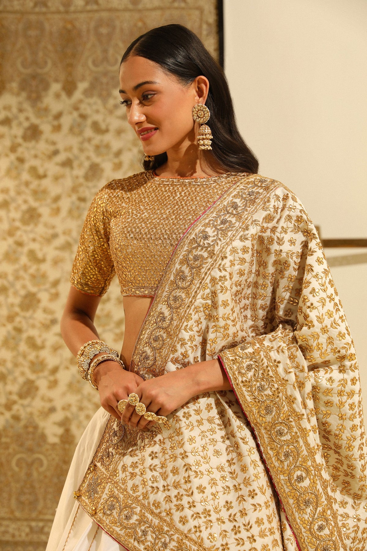 Dolly Jain In Aarif - Daisy Ivory Hand Embroidered Lehenga set with Odhni