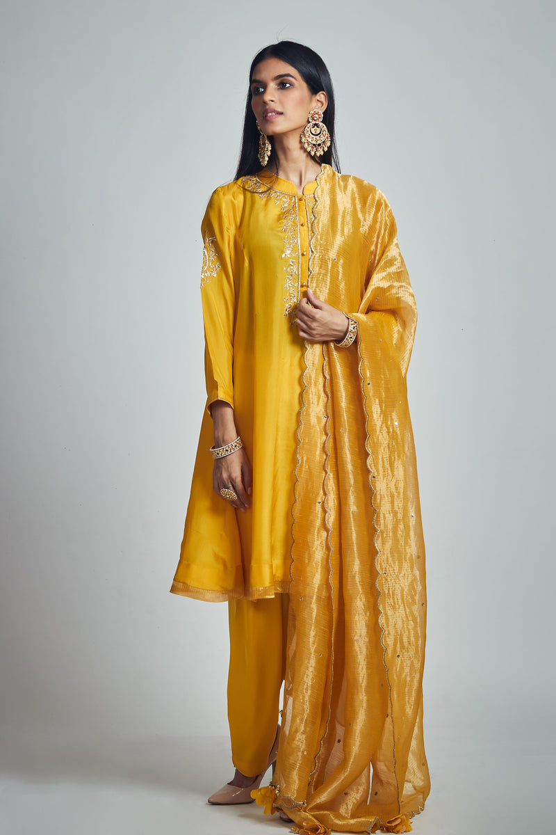 Nazish- Happy mustard Habutai silk embroidered ensemble