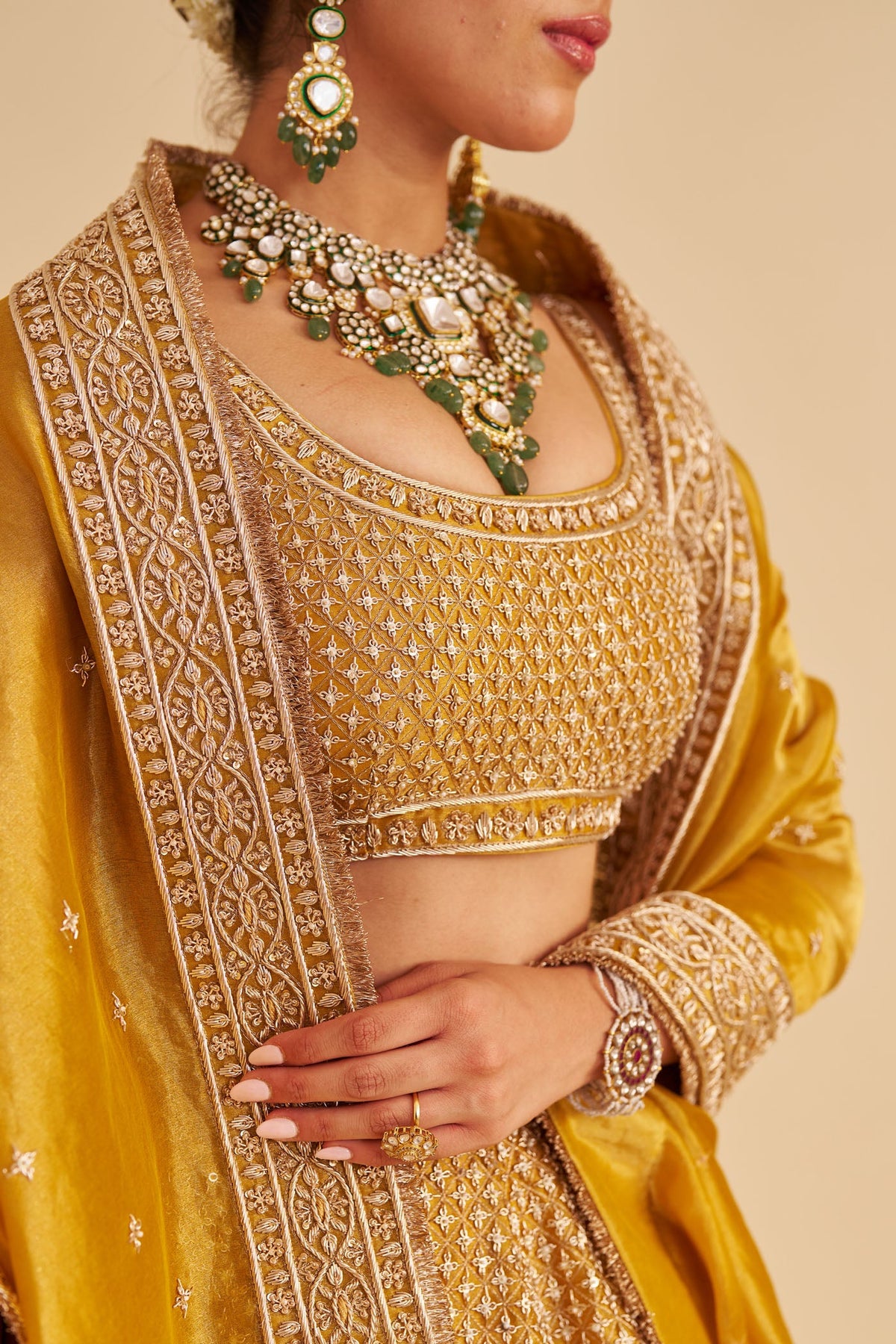 Aashina  - Dabka Zardozi Embroidered Pure Tissue Mustard Gold Lehenga Set