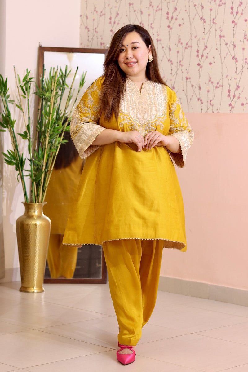 SHRADDHA GURUNG IN MOHSINA - Glaze Mustard SHORT KALIDAAR CHOGA WITH SALWAR