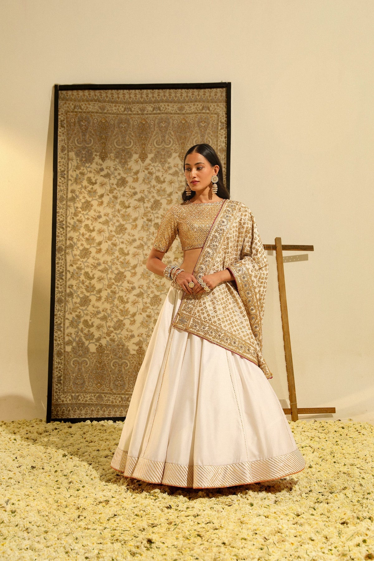 Dolly Jain In Aarif - Daisy Ivory Hand Embroidered Lehenga set with Odhni