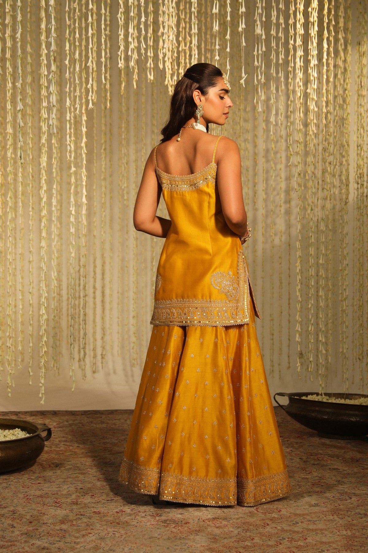 Shruti Juneja In AABROO - Glaze Mustard SHORT KURTA WITH SHARARA AND DUPATTA