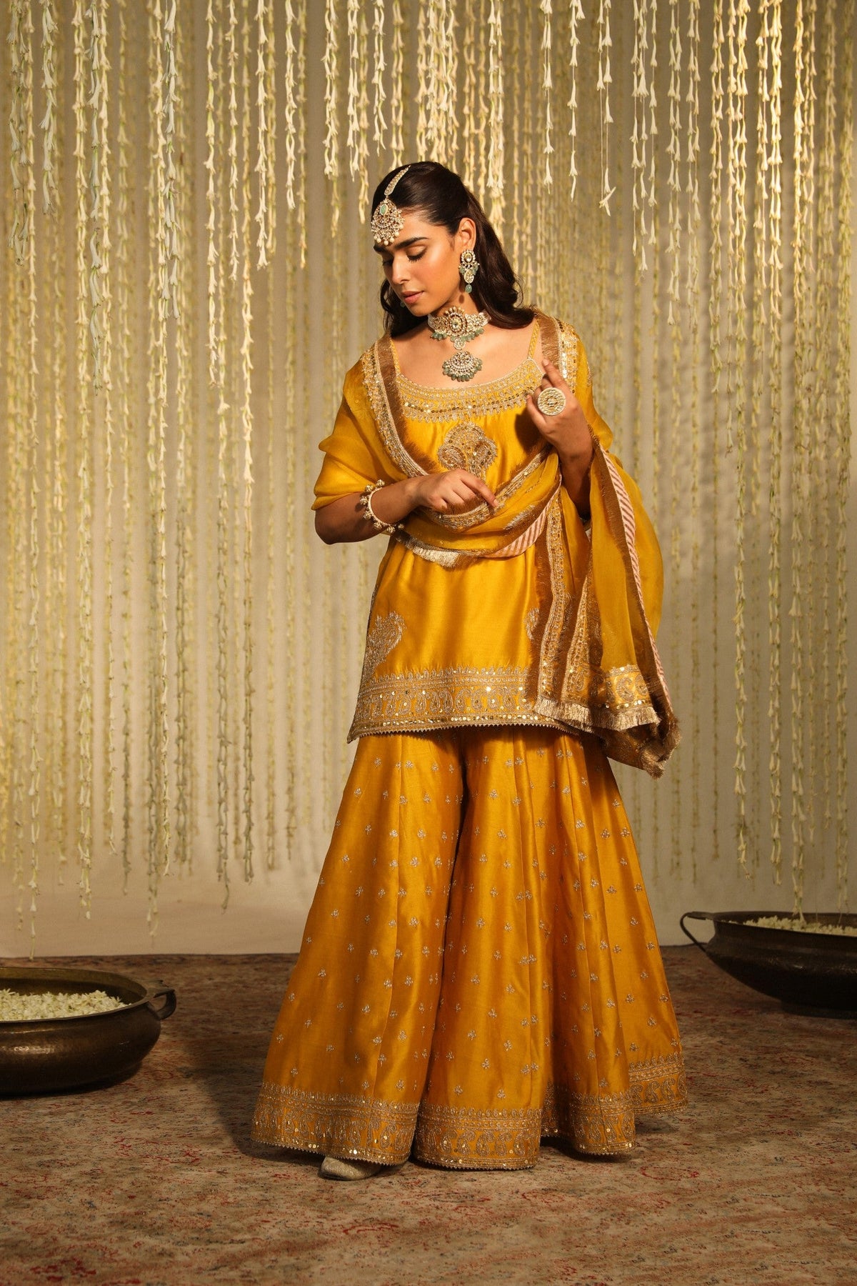 Shruti Juneja In AABROO - Glaze Mustard SHORT KURTA WITH SHARARA AND DUPATTA