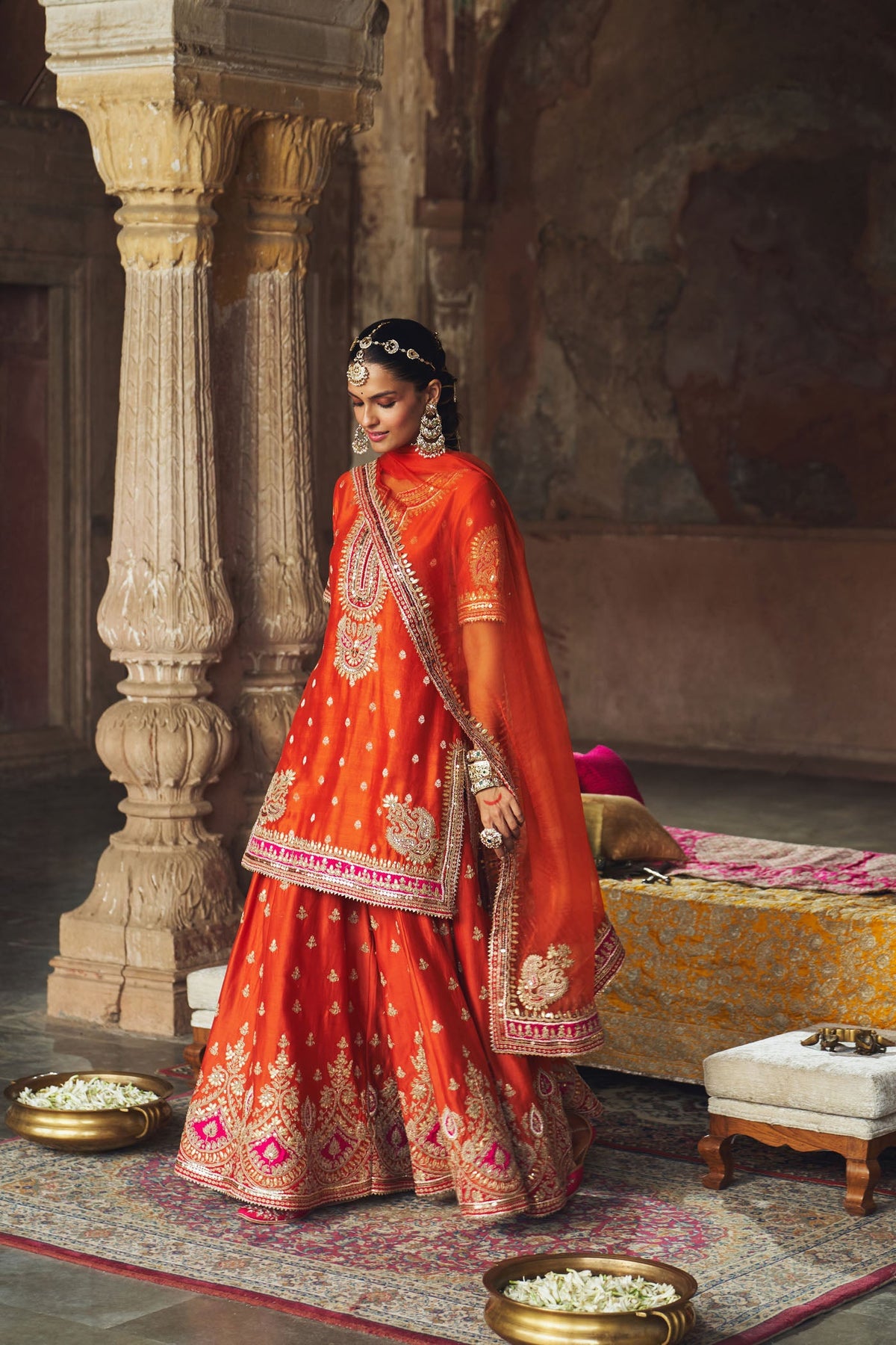 ANJALI KHUSHALANI IN AREESHA - BURNT ORANGE SHORT KURTA WITH SHARARA AND DUPATTA